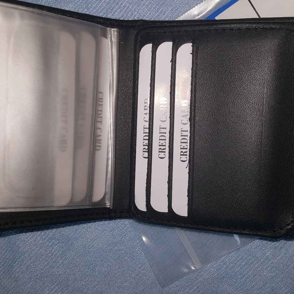 Leather tri fold wallet NWT.
